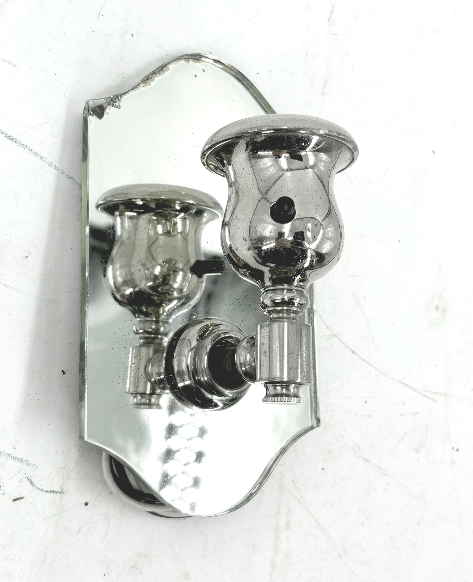 Petite mirror back chrome deco barebulb sconce: Petite mirror back chrome deco barebulb sconce. Medium Edison socket. 7" tall x 4" wide x 3.25" projection. This item is offered with no reserve.