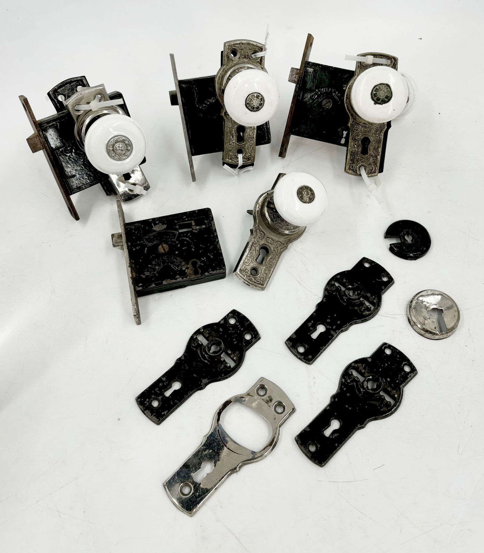 Group of three thumblatch passage sets with mortices and extra hardware (1 of 18)