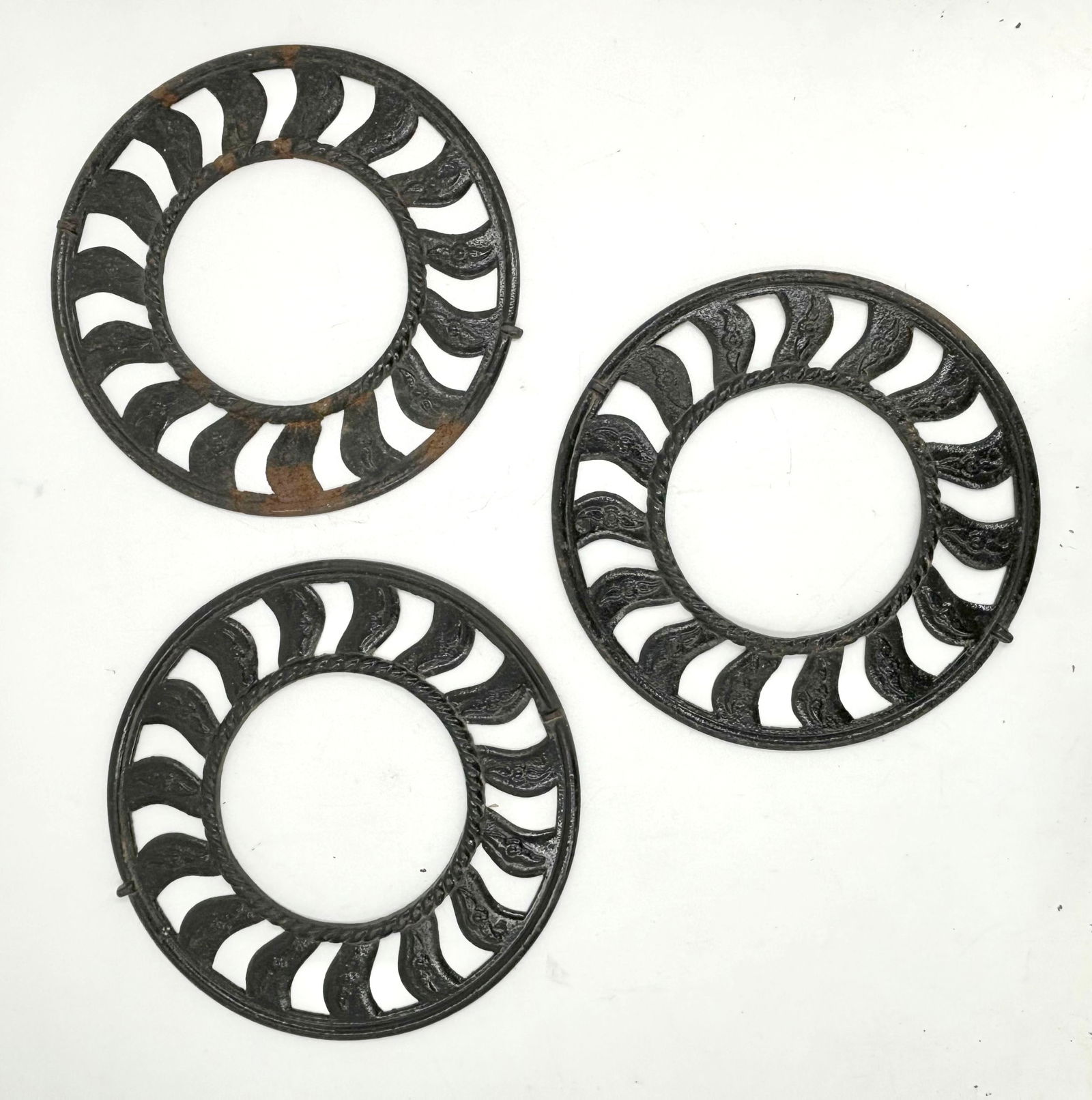 Set of three matching cast iron circular grates (1 of 12)