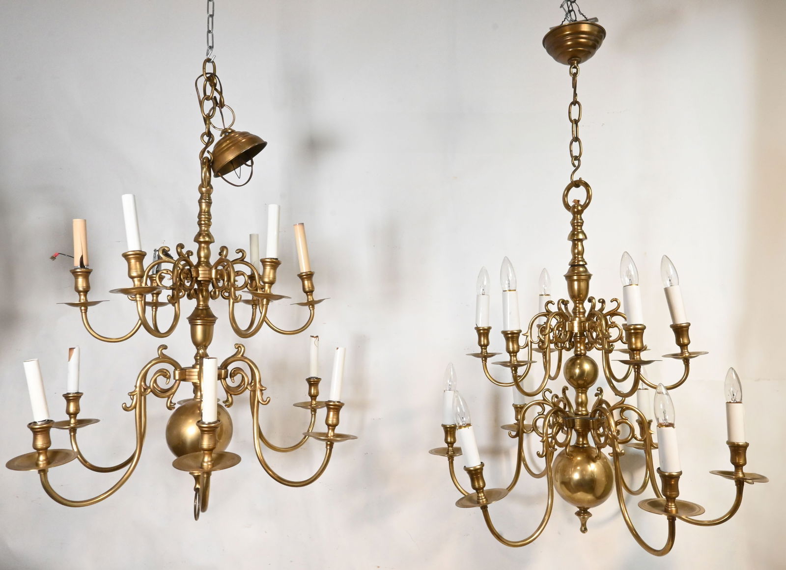 Pair of cast polished brass twelve candle chandeliers (1 of 2)