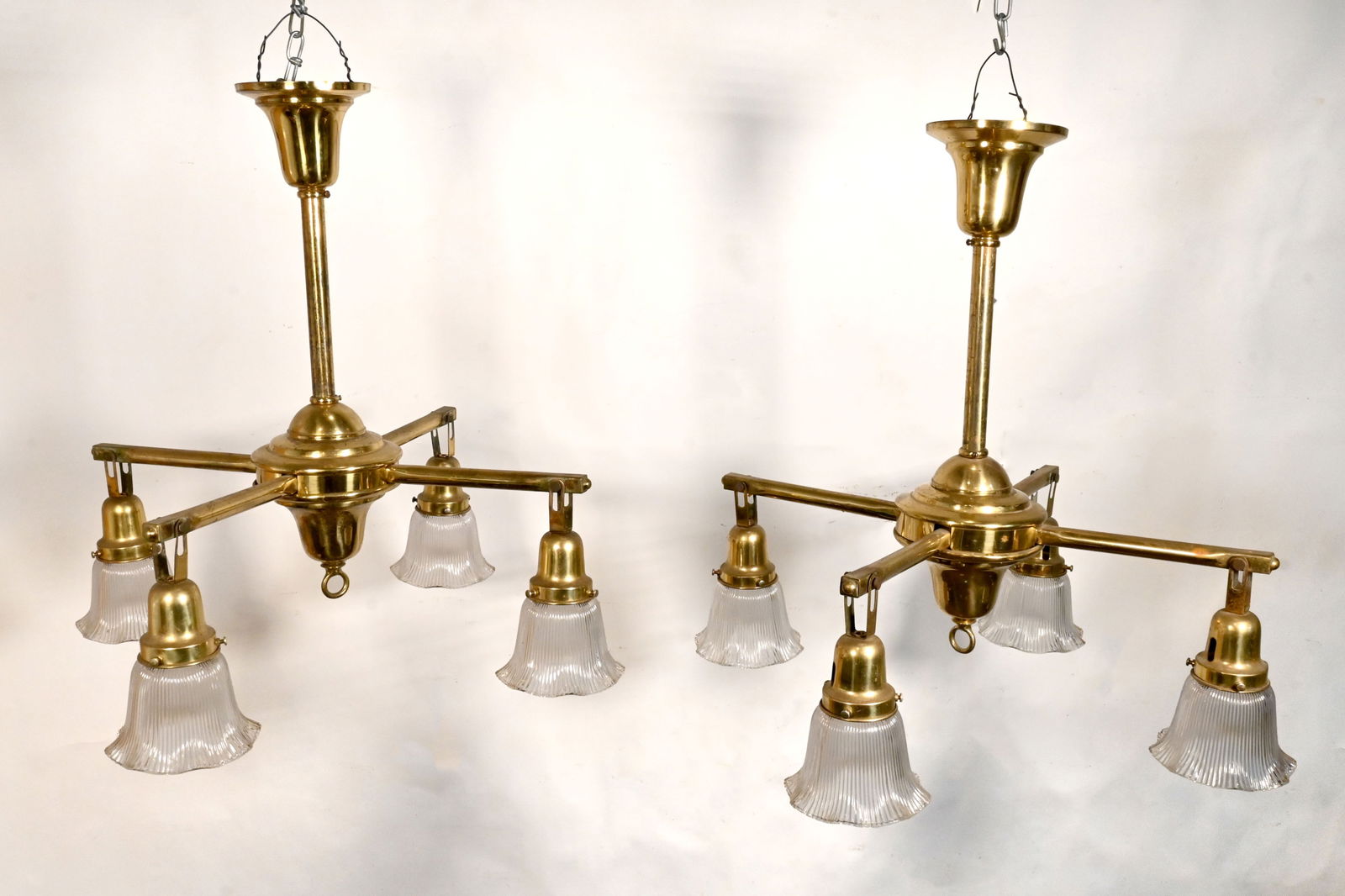 Pair of four arm polished brass chandeliers with ruffled prismatic shades (1 of 2)