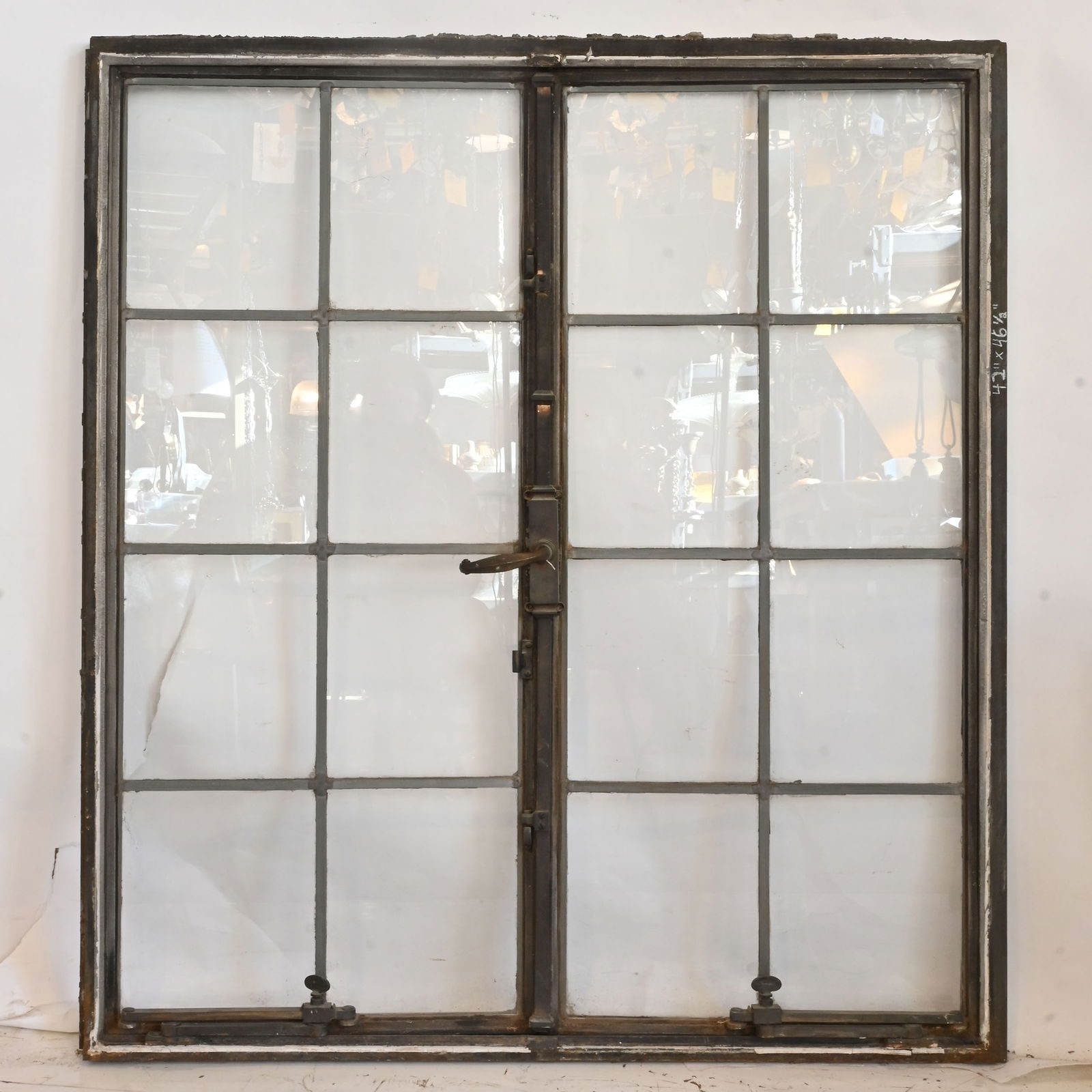 Double iron casement window with sixteen leaded panes (1 of 2)