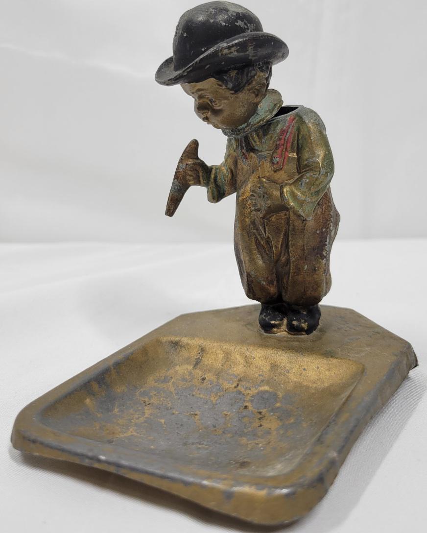 Antique Ashtray Nodder: features guy smoking cigar