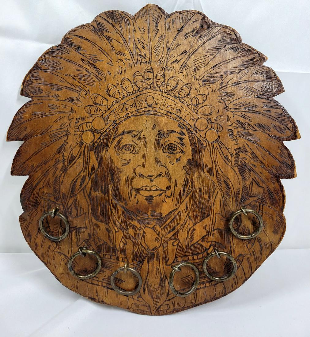 Antique Native American Pyrography: nice antique pyrography of indian 13.5"x13" has hooks for something