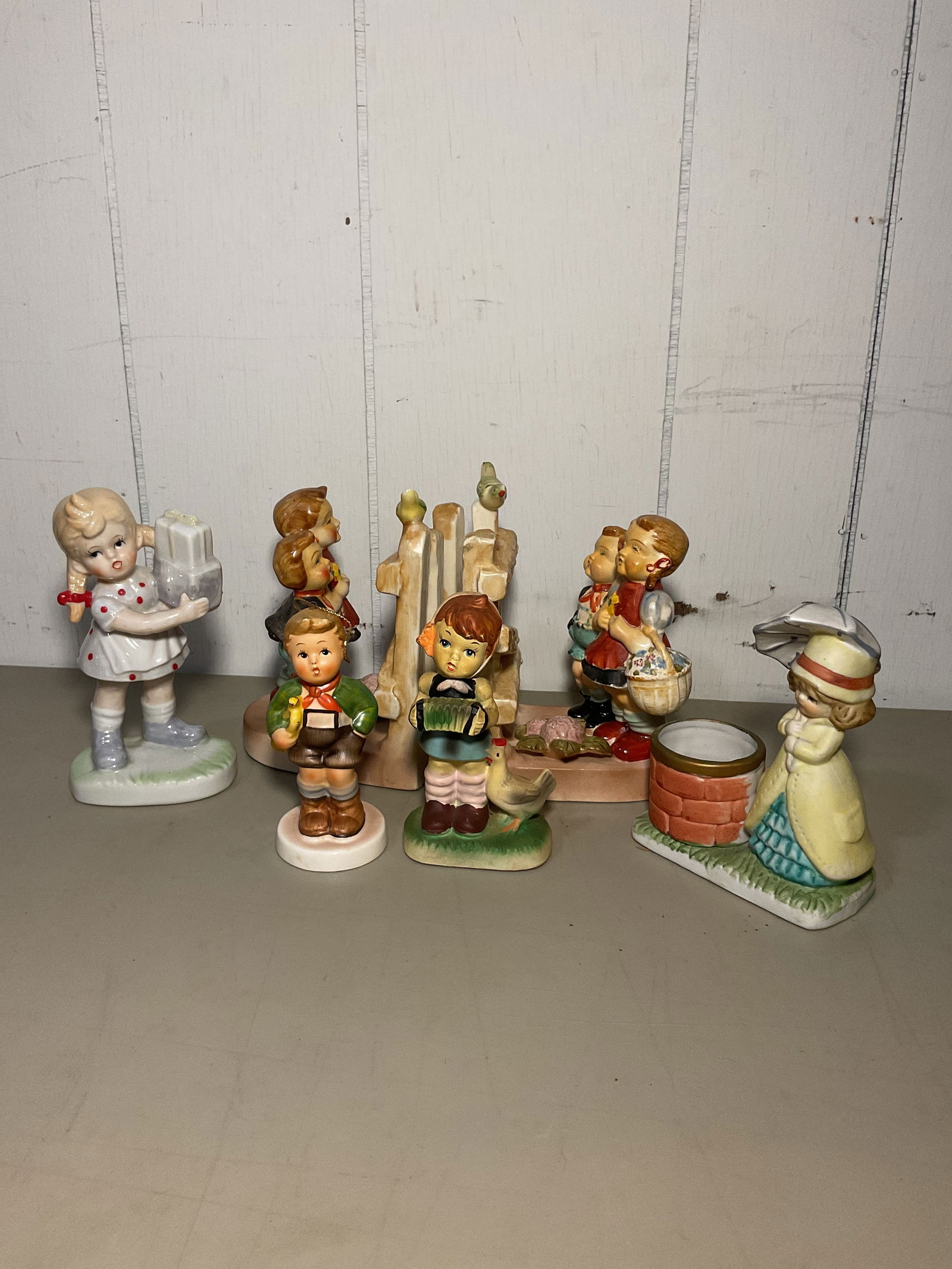 Vintage Japan Figurine Lot: 4 total figurines and set of bookends occupied Japan Crazing no chips or cracks