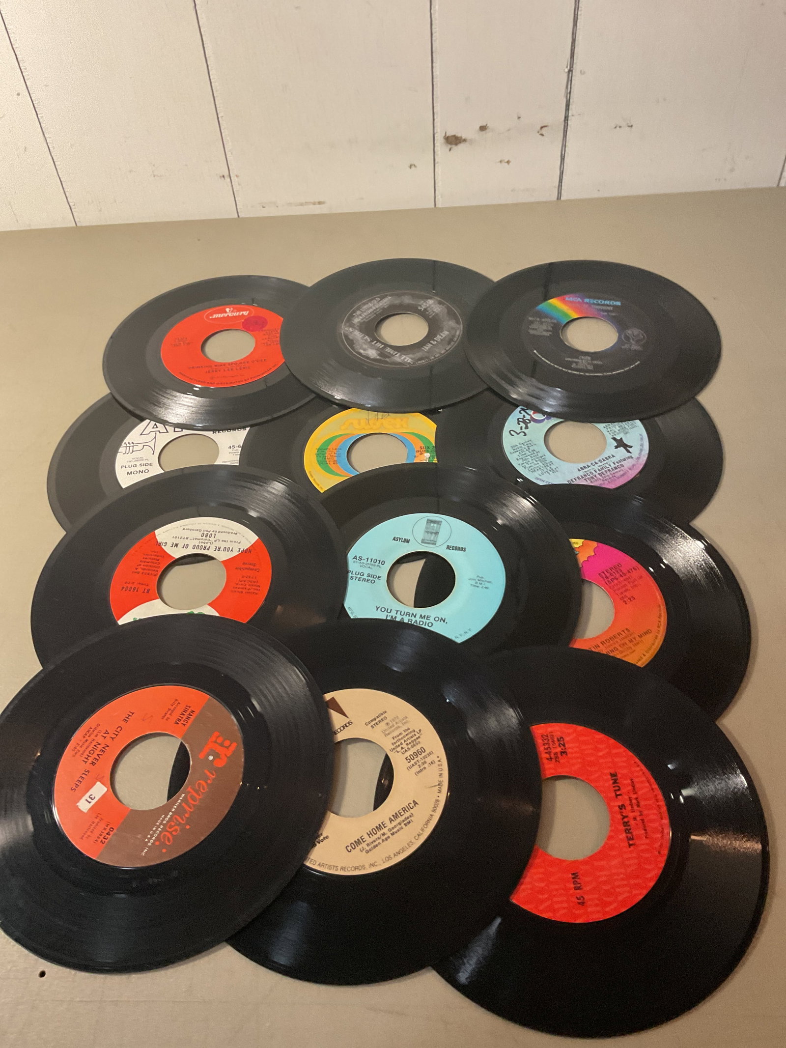 Lot of 45 rpm vinyl records: All play and graded VG to EXCMost came from a radio station and many collections