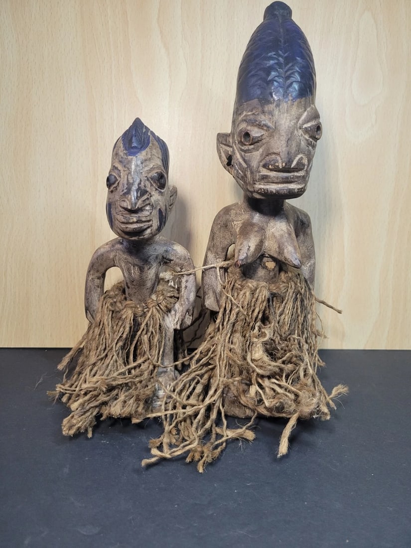 Ibeji Twin Figures of the Yoruba Wooddn Statues: Ibeji Twin Figures of the Yoruba Wooden Statues. Tallest us approximately 9 inches.