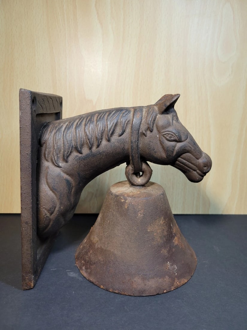 Cast Iron Horse Dinner Bell: Cast Iron Horse Dinner Bell. Bell does have surface rust and missing clappe