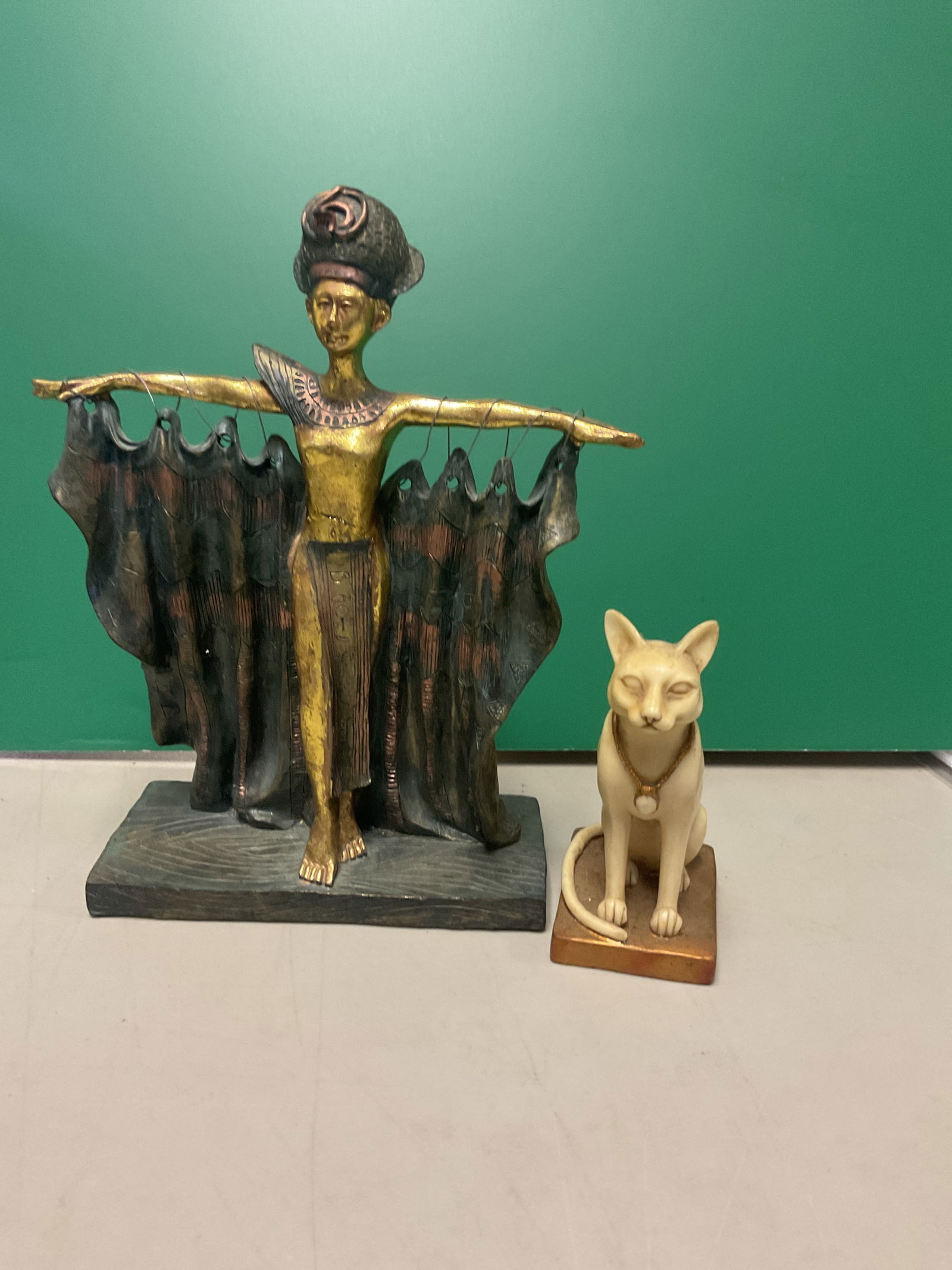 Vintage Egyptian Figures: Lady is wood approx 8”Cat is approx 4-5” bast