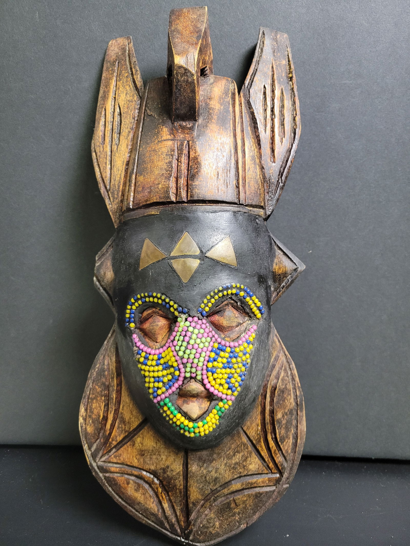 Hand Carved Ghanaian Bakuta decorative mask Yoruba tribe: 12.5x5”