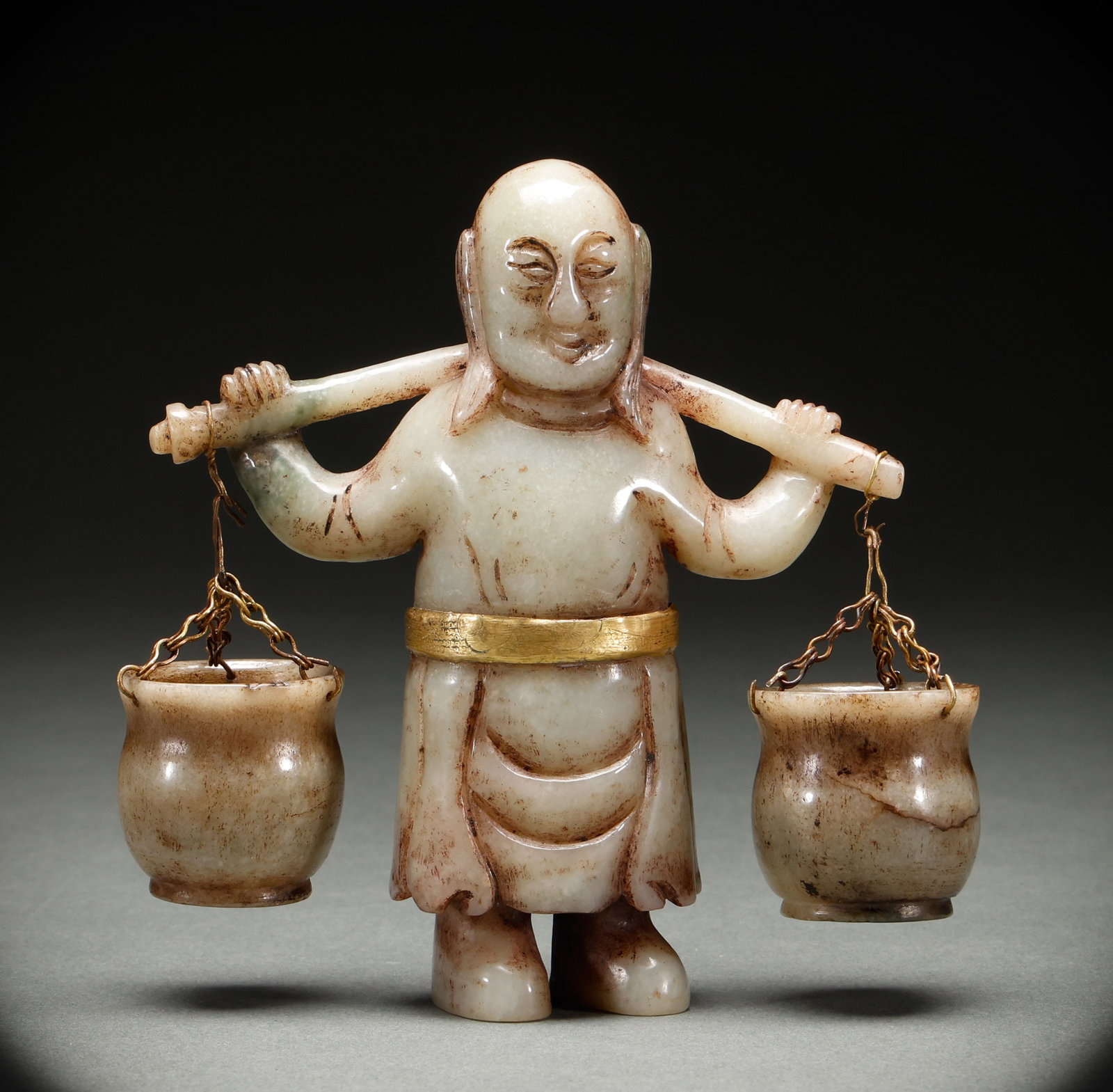 Statues of Hotan Jade Man Carrying Water in the Qing Dynasty or before: Height: 12.5cm, Width: 11cm, Weight: 362g