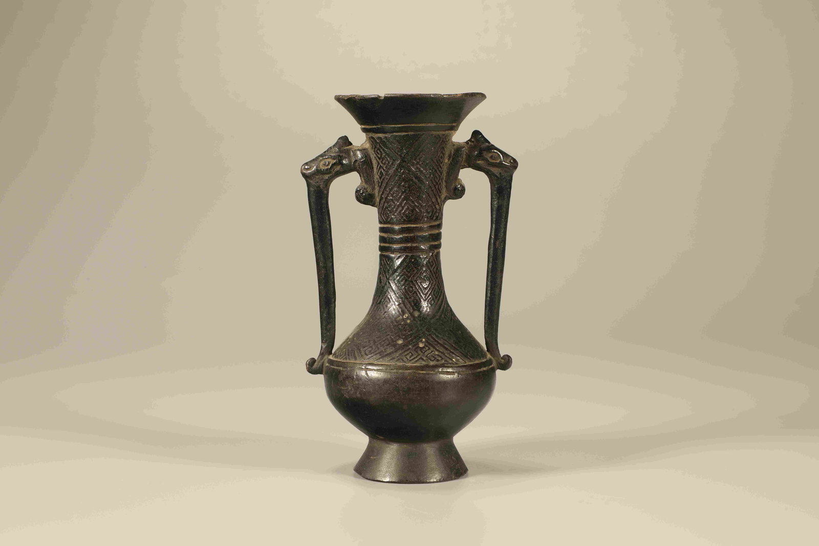 Qing Dynasty Bronze Beast Ear Bottle: Height: 12.5cm, Width: 7cm,