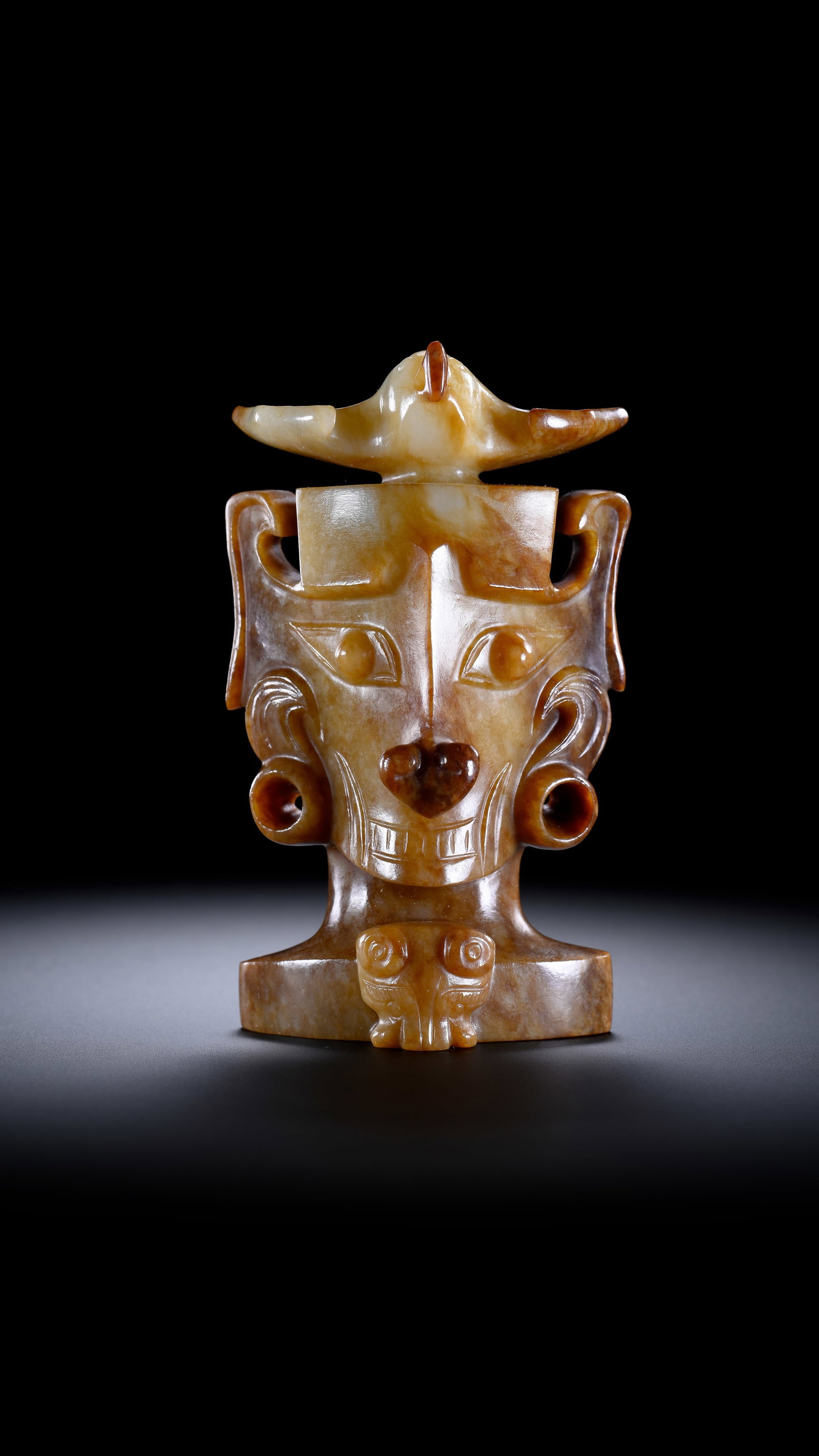 Hotan Jade Man Face Ornament before the Ming Dynasty: Height: 9cm, Width: 5.4cm, Weight: 177g
