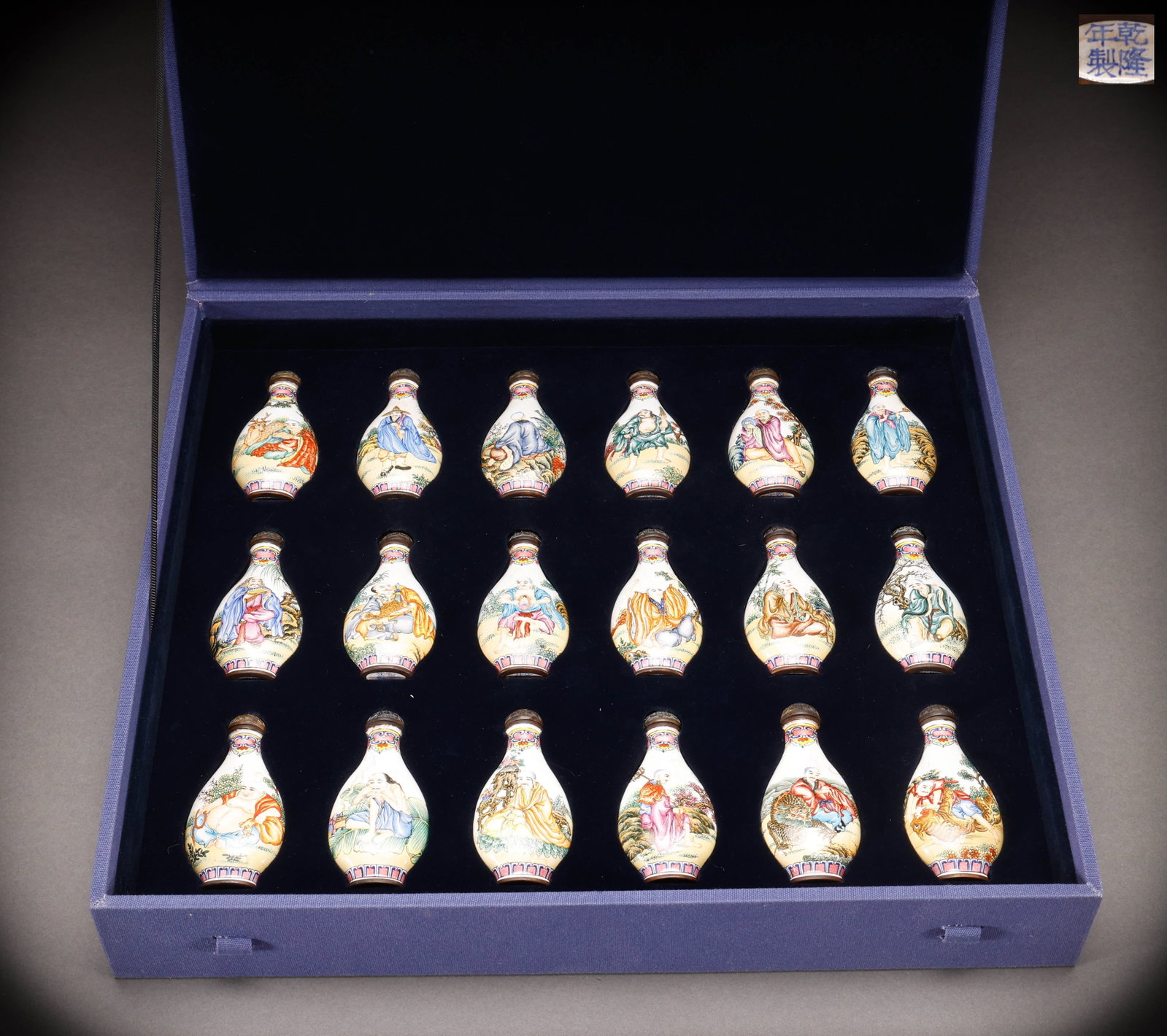 Qing Dynasty copper body enamel colored 18 arhat snuff bottle: Height: 8cm, Width: 3.9cm, Weight: 947g