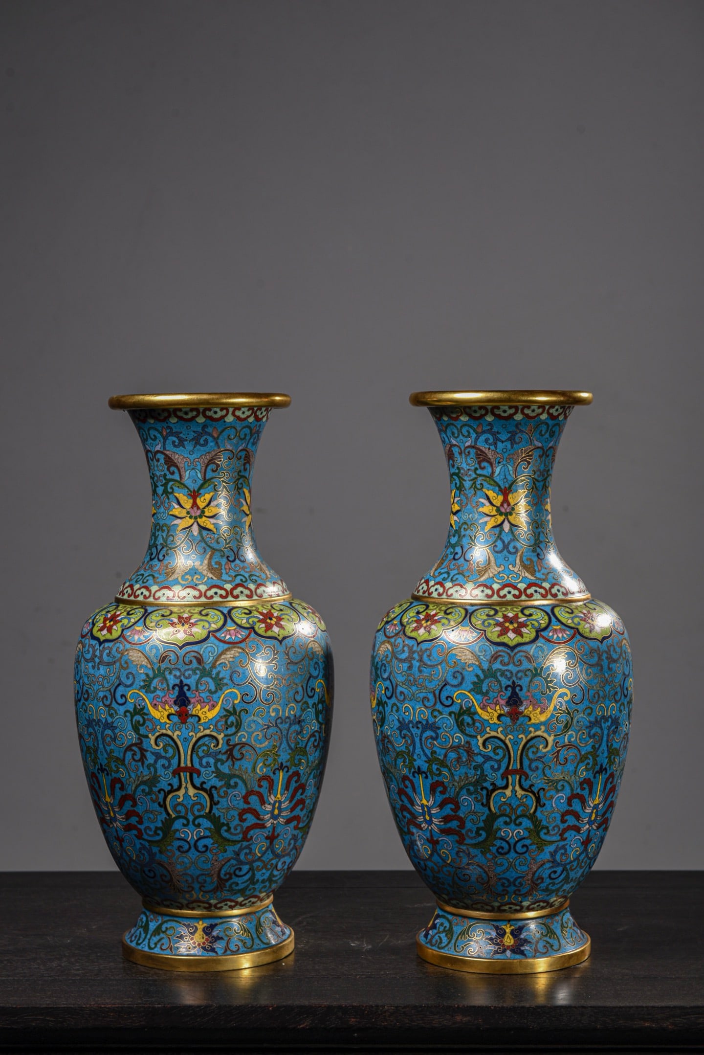 A pair of Qing Dynasty copper bodied enamel colored open bottles (1 of 9)