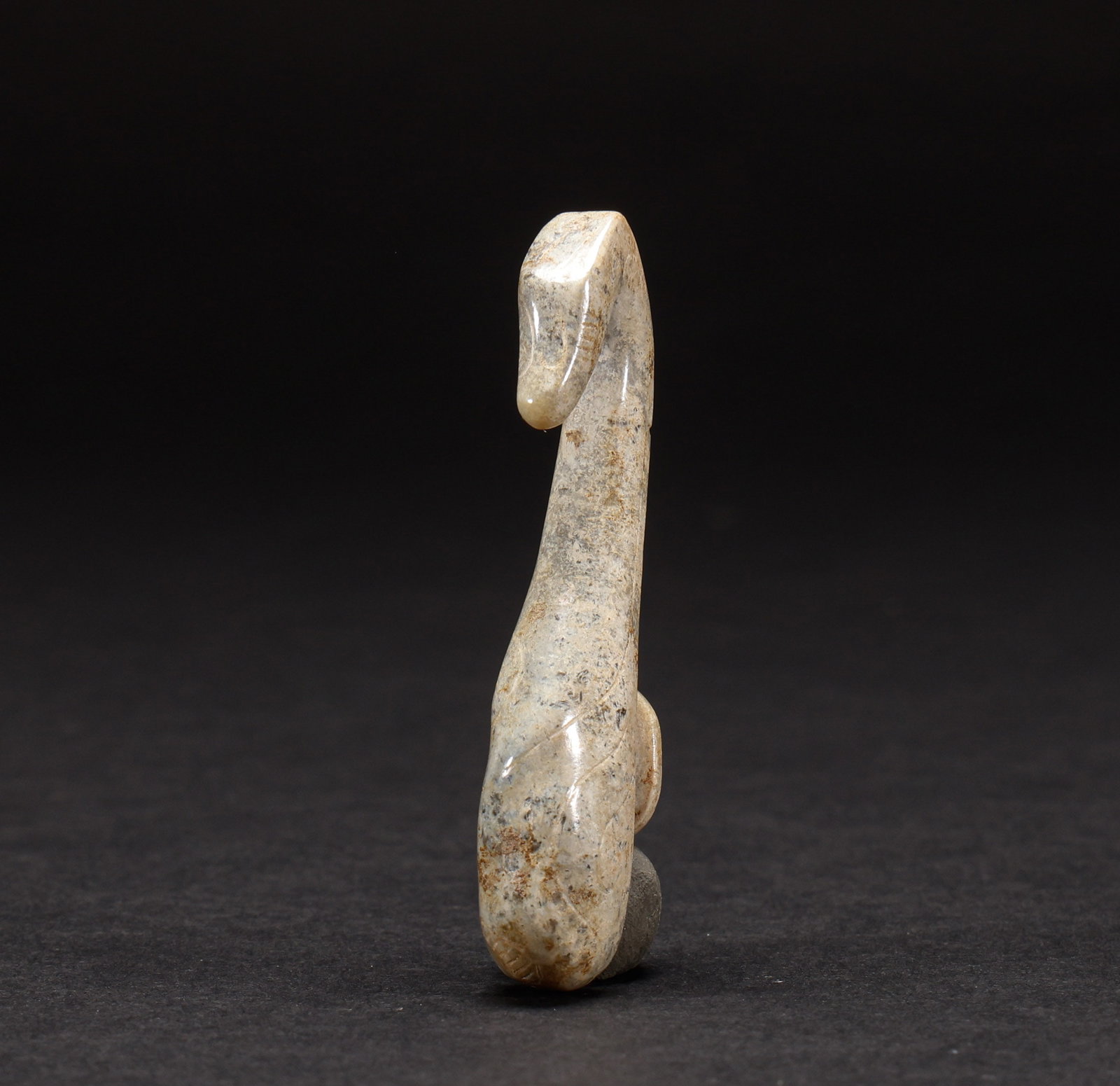 Hotan Jade Belt Hook before the Ming Dynasty: Height: 6cm, Width: 1.5cm, Weight: 16g