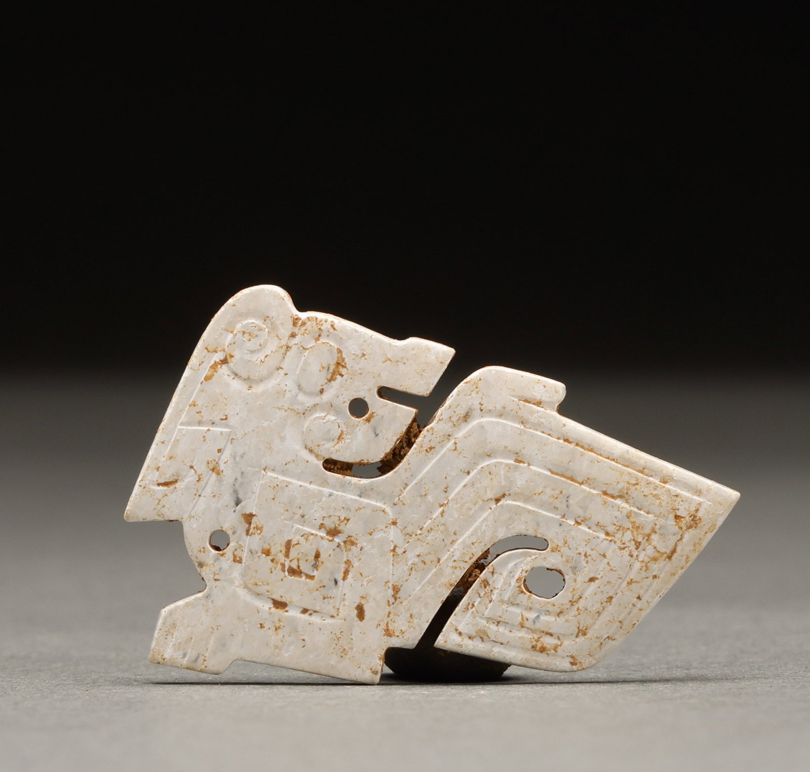 Hetian jade pendant before the Ming Dynasty: Height: 3cm, Width: 4.5cm, Weight: 7g