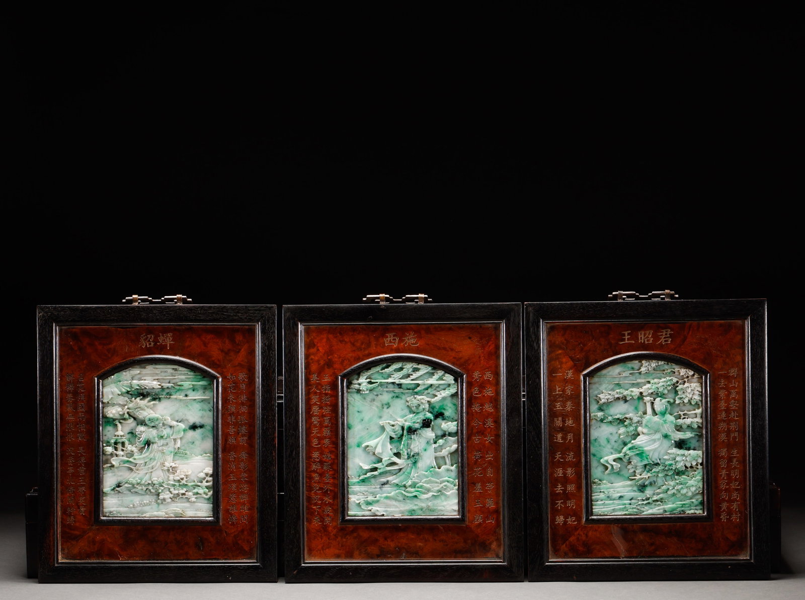 A set of screen inserts featuring the three beautiful women of Qing Dynasty jade embedded with: Jadeite three beauties table screen set, jadeite relief carved Diaochan, Xishi and Wang Zhaojun, each with inscribed poem, with Hongmu frame. Height: 32cm, Width: 28cm.