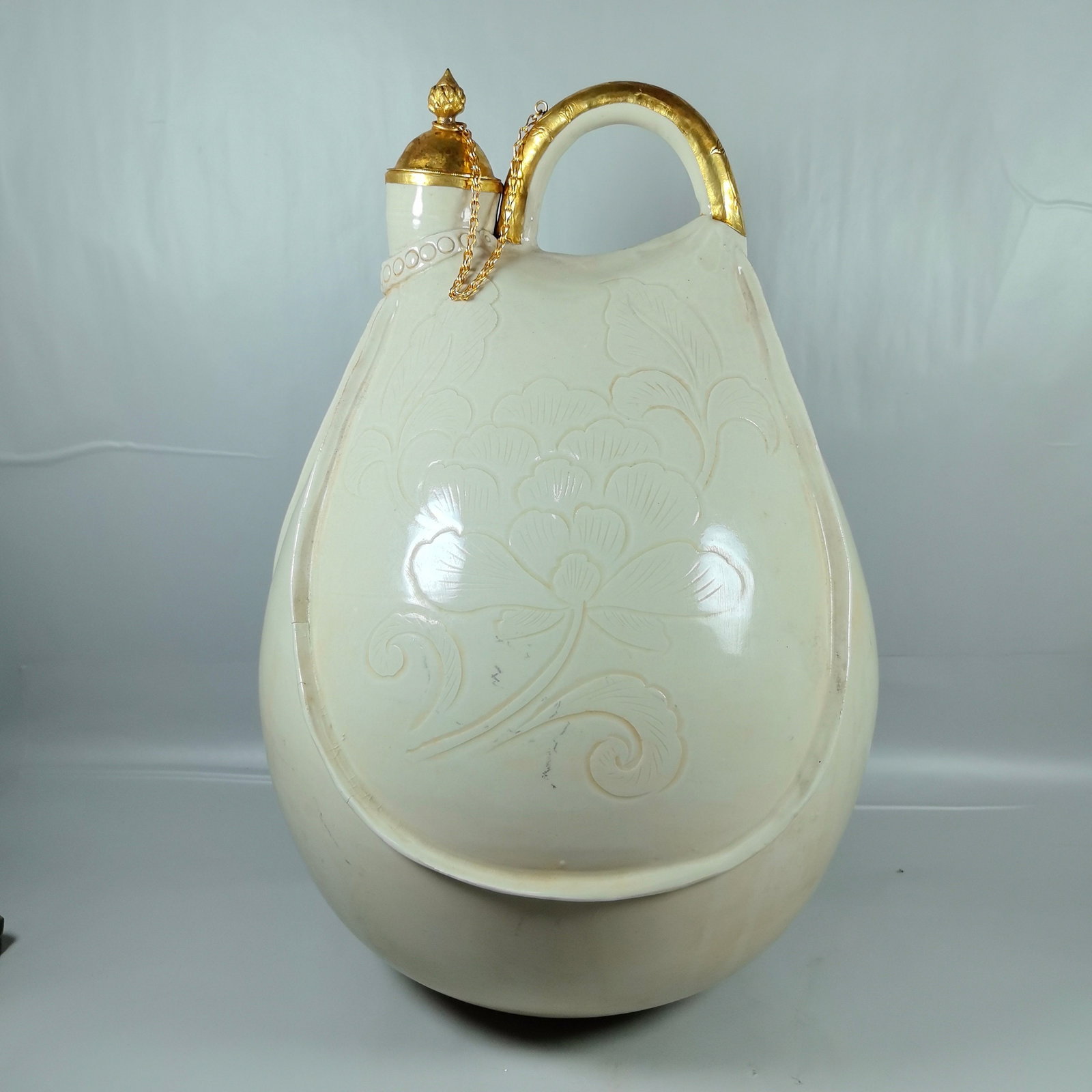 Song Dynasty Ding Kiln White Glazed Carved Flower Wrapped Gold Beam Pot (1 of 9)