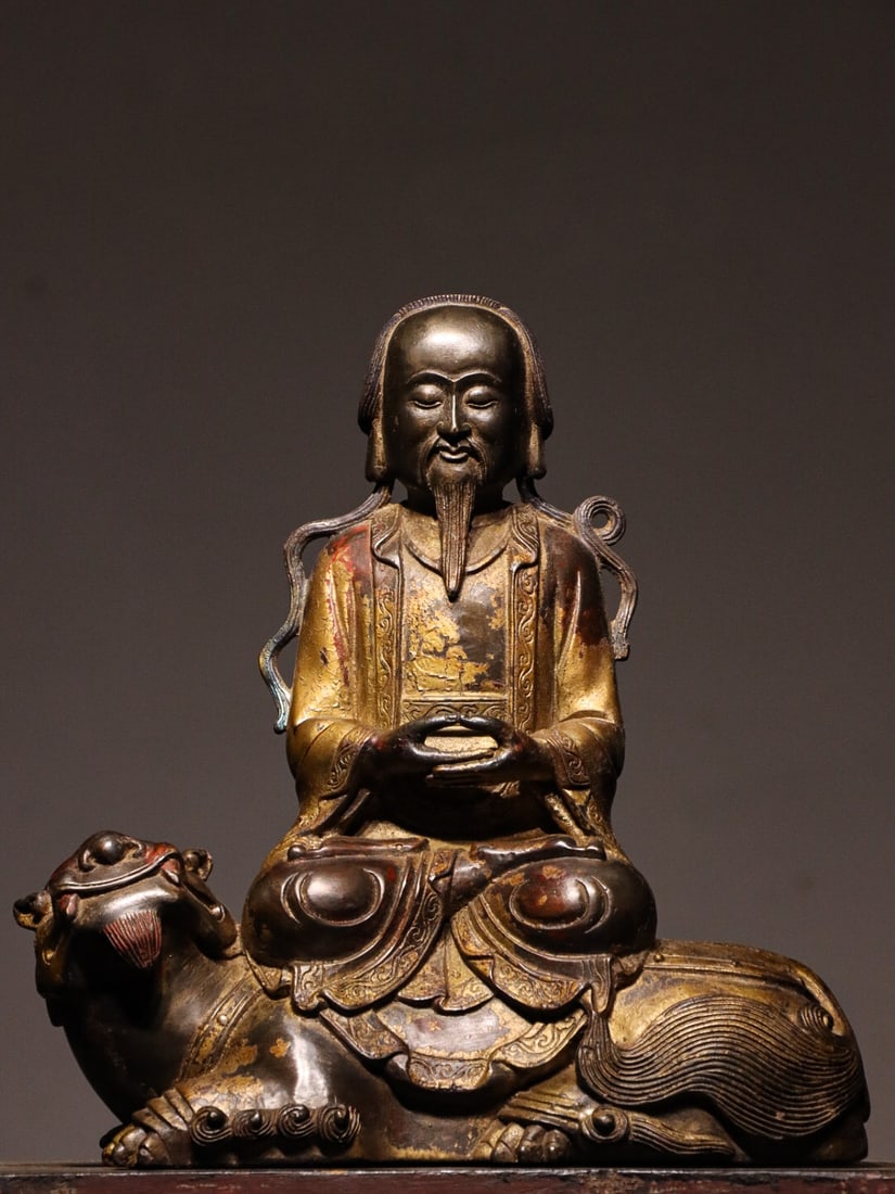 Bronze gilded statue of Tai Shang Lao Jun riding a cow in the Qing Dynasty (1 of 9)