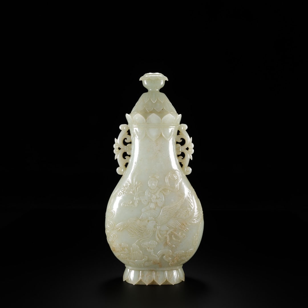 Qing Dynasty Blue and White Jade Carving of Phoenix Riding Figure with Double Eared Bottle Lid (1 of 9)