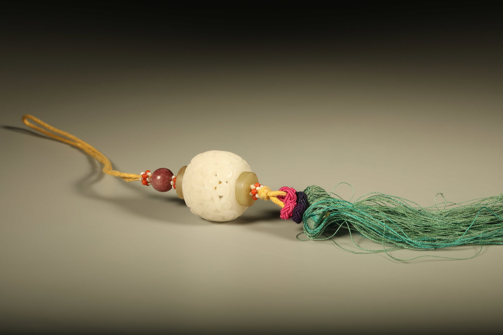 Hetian Jade Carved Grass Scroll Sachet of the Qing Dynasty (1 of 6)