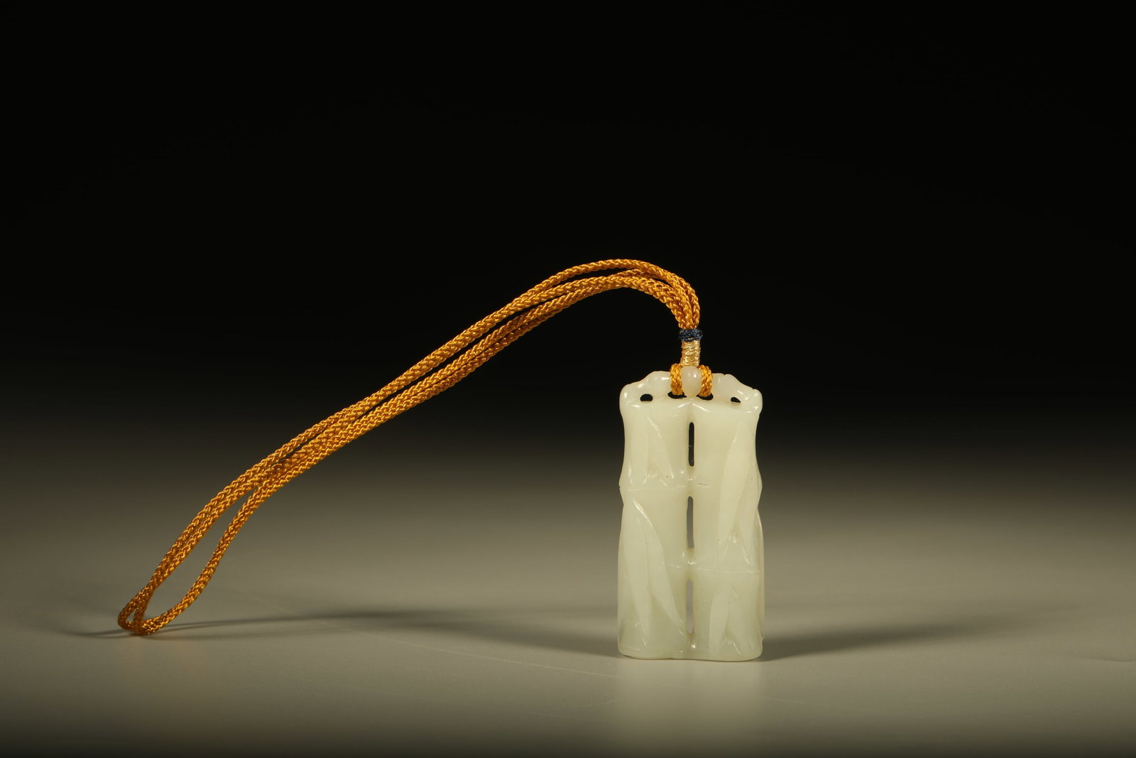Hetian Jade Carving of the Qing Dynasty: Hetian jade carved rising-step-by-step ornament, warm and lustrous jade, fine carving, symbolizing auspiciousness, displayed on desk. Dimensions: Height: 5cm, Width: 2.5cm.