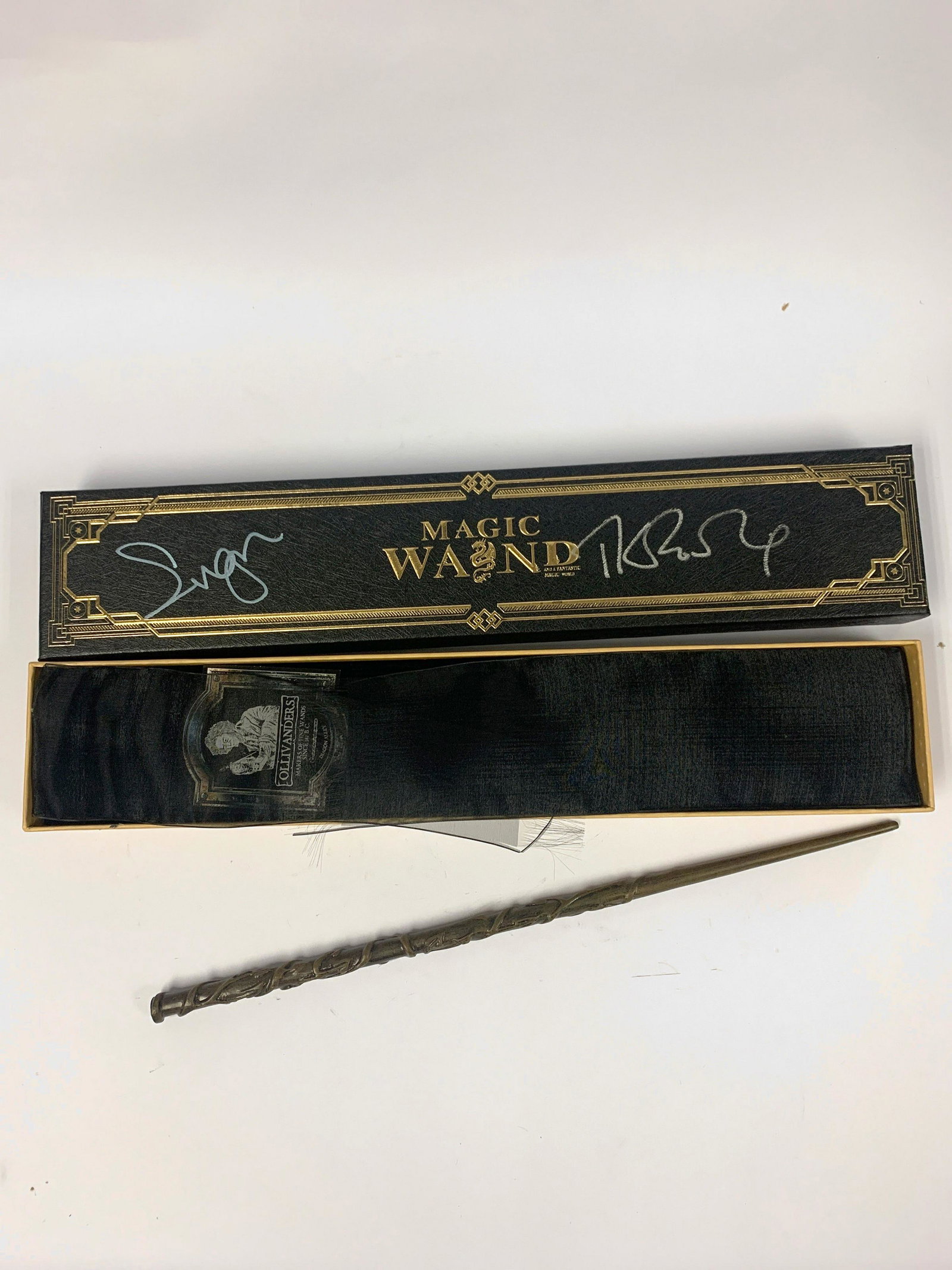 Autographed Harry Potter Wand: Autograph Name(s): Emma Watson, JK Rowling