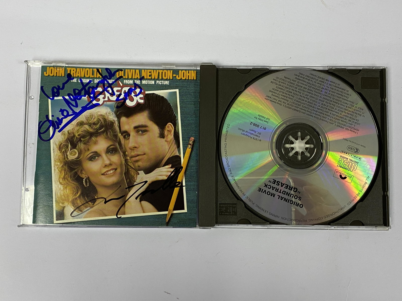 Autograph Grease CD Album: Category: CollectiblesAutograph: John Travolta, Olivia Newton-John Item Condition: Brand New