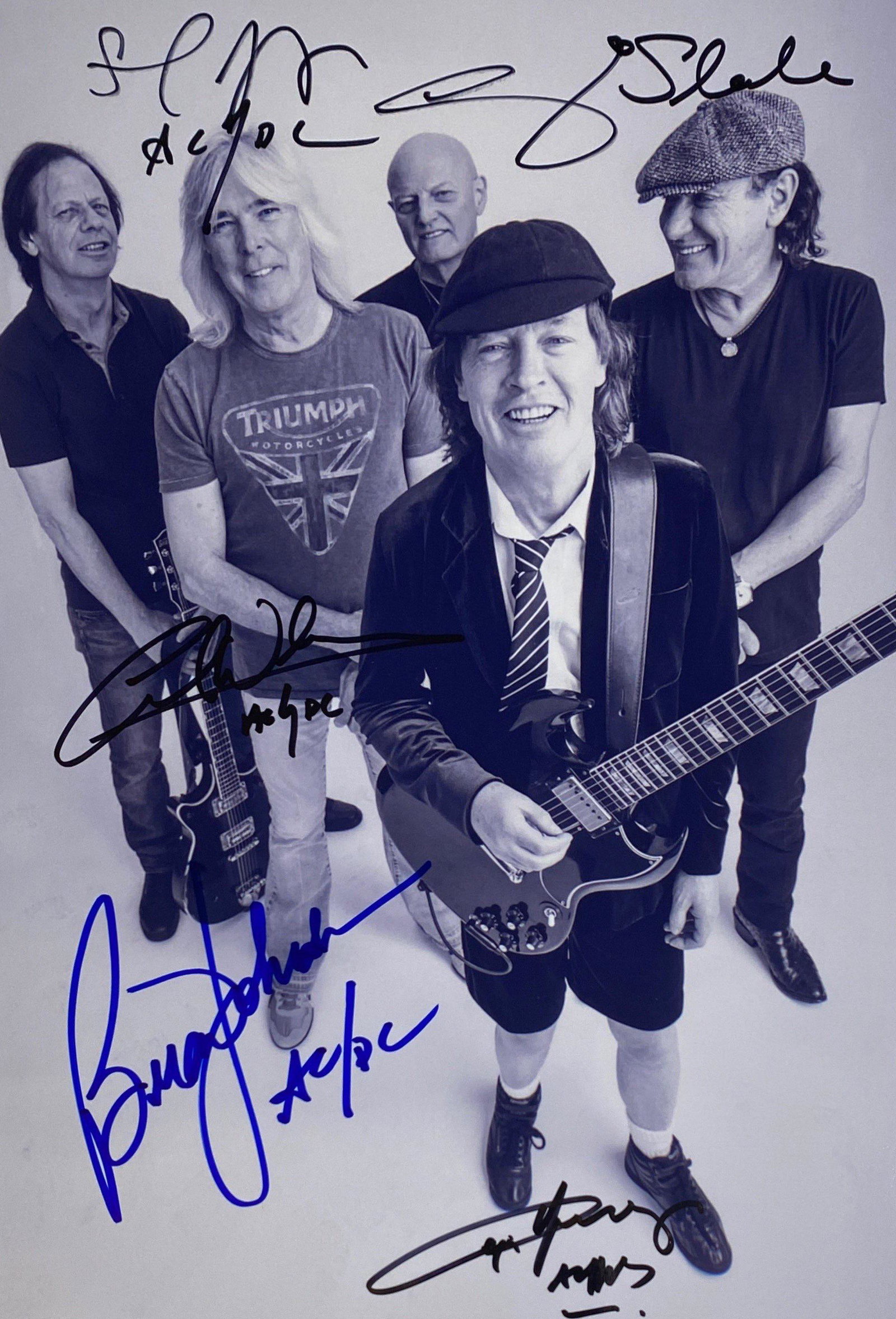 Autograph ACDC Photo: Category: CollectiblesSize: 8 x 10Autograph: Angus Young, Malcolm Young, Stevie Young, Brian Johnson, Cliff Williams, Slade