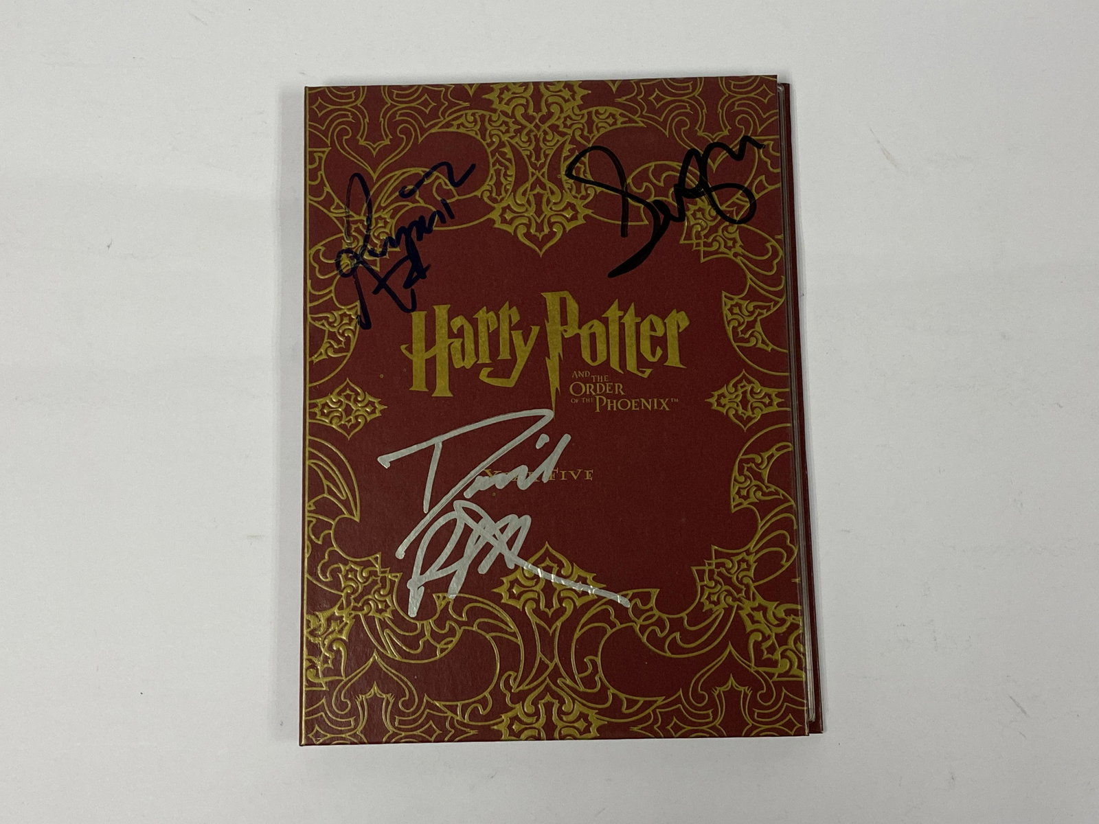 Autograph Harry Potter DVD: Category: CollectiblesAutograph By: Daniel Radcliffe, Emma Watson, Rupert Grint Item Condition: Brand New