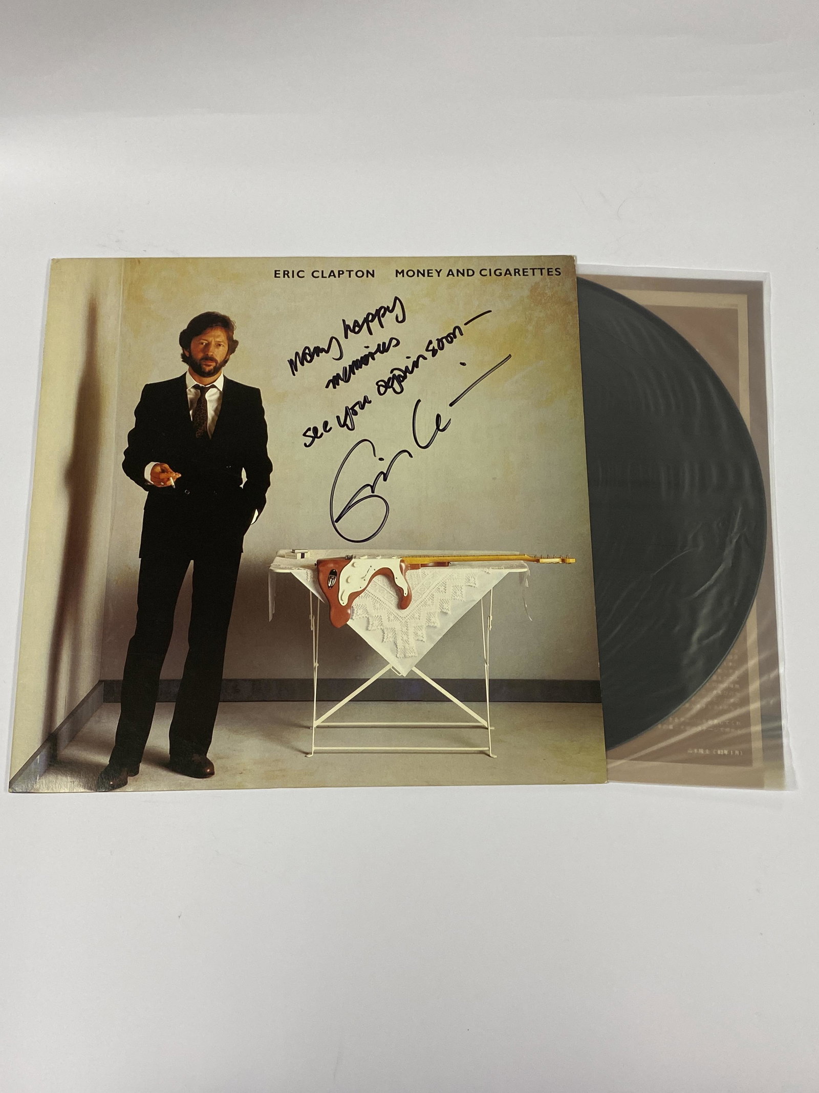 Autograph Money and Cigarettes Vinyl: Category: CollectiblesAutograph: Eric Clapton Item Condition: Brand New