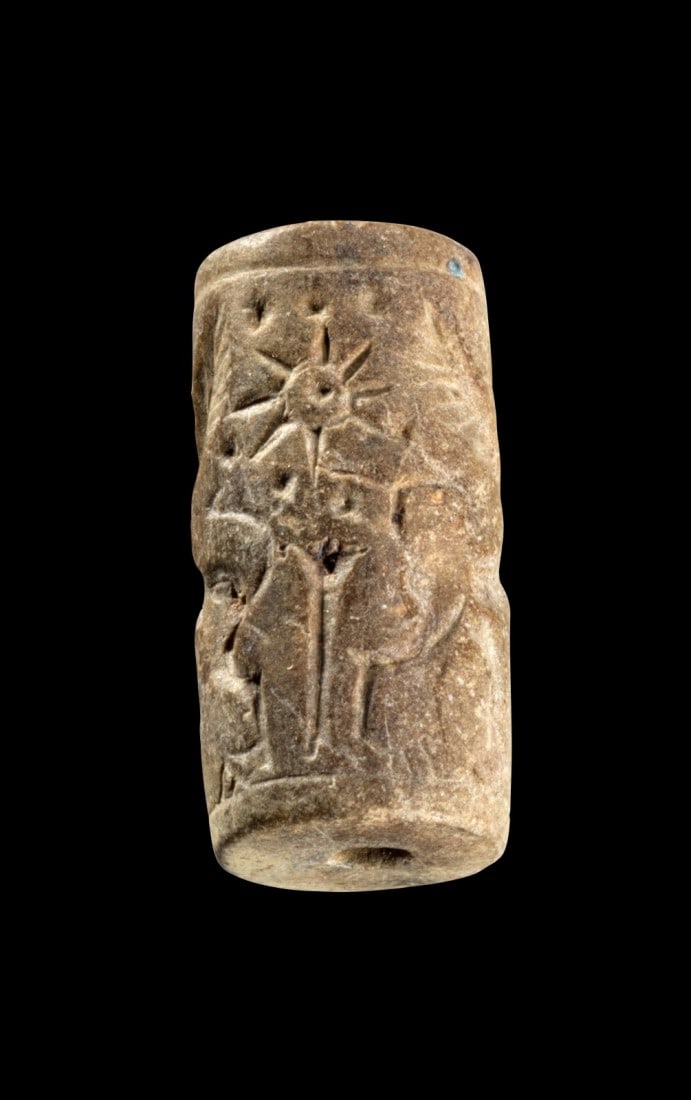 Rollsiegel mit Held und Greifen. (1 of 2)