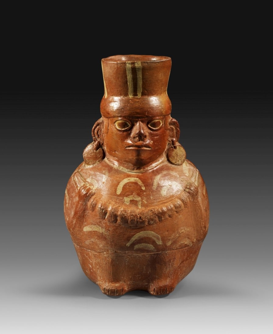 Gefäß mit einem Träger. (1 of 1)