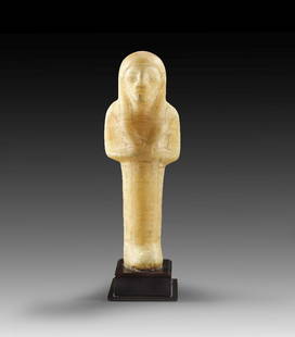 Uschebti des Prinzen Month-her-chepeschef.: Shabti of prince Month-her-chepeschef. New Kingdom, 20th dynasty, time of Ramses IX, circa 1127-1109 BC. Alabaster. Details painted in black and red colour. H 20.2cm. Mummy-shaped with tripartite wig