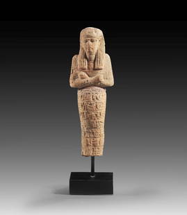 Uschebti des Paser, Wesir und Hohepriester des Amun.: Shabti of Paser, vizier and high priest of Amun. Clay, remnants of colour, H 17.4cm. New Kingdom, reign of Seti I and Ramses II, about 1310 - 1240 BC. Mummy-shaped with tripartite wig and two ploughs