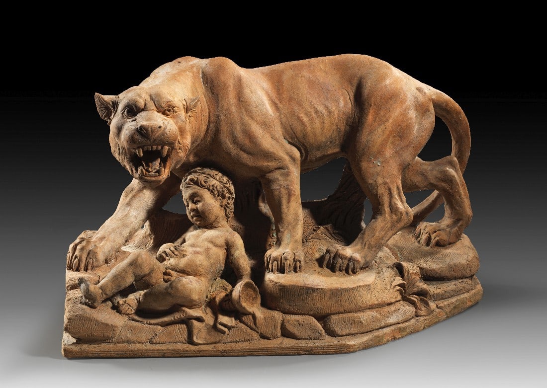 Terrakottafigur eines Panthers.: Terrakottafigur eines Panthers. 19. - 20. Jh. n. Chr. Hellroter Ton, L 45cm. Auf zungenförmiger Plinthe mit Felsen. Der Panther beschützt mit gefletschten Zähnen den Dionysosknaben, der trunken