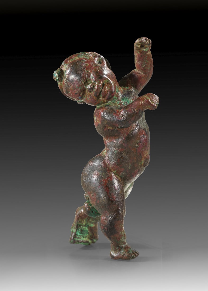 Groteskentaenzer.: Groteskentaenzer. Ptolemaeisch oder fruehe Kaiserzeit, 2. Jh. v. Chr. - 1. Jh. n. Chr. H 8cm. Zwergenhafte, maennliche, nackte Figur in einer Drehbewegung mit angehobenen Haenden, die vielleicht urspr