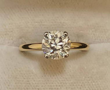 2.00 ct. Natural Round Diamond Solitaire Ring in 14k Yellow Gold: 2.00 ct. Natural Round Diamond Solitaire Ring set in solid 14k Yellow Gold 3.12 Grams. No Treatments 100% Natural Earth Diamond. Color H - I. Clarity VS-2 / SI-1 100% Eye Clean near loupe clean. Curre