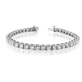 3.00 ct. Natural Round Diamond Tennis Bracelet 14k White Gold.: This Diamonds tennis bracelet has a total weight of 3.00 carats. The diamonds are set in a four prong setting and have a diamond quality of G - H Color SI/I Clarity. This bracelet has a Double safety 