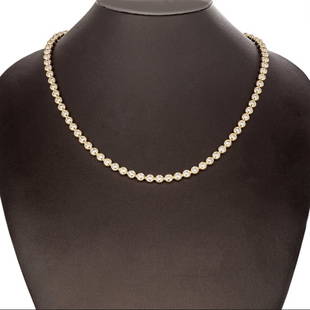 8.62 ct. Natural Round Diamond Tennis Necklace in 14k Yellow Gold: Turn heads with this glamours 8.62 ct. natural diamond necklace showcasing 82 diamonds set in 14k yellow gold. Diamond Specifications: Count: 82 diamonds Shape: Round TCW: 8.62 ct. Type: Natural Diamo