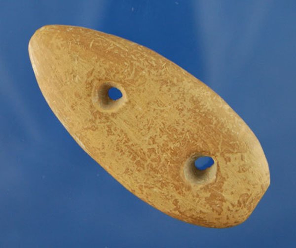 2 13/16" 2 hole Gorget found in Bell county TX. Ex: 2 13/16" 2 hole Gorget found in Bell county TX. Ex Floyd Easterwood. Rogers COA.