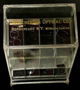 1896 Winchester Optical JT Robin Display Case: Exceptional Winchester Optical Display Case. Pat Date 1896 by J.T. Robin Co. Etched foiled Ad Glass, with the original display contents. Only flaw a break to the bottom which could be easily repaired