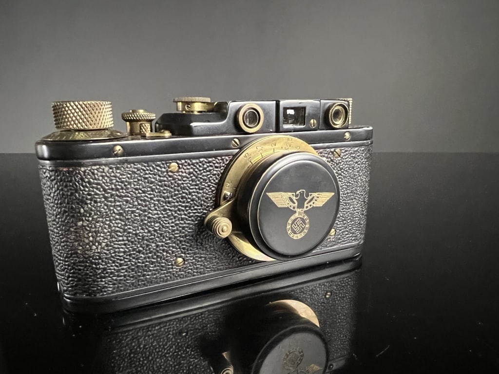 Fake Leica II Nazi Copy: Example of a Fake Leica II with Nazi Symbolism engraved, poorly. Untested.