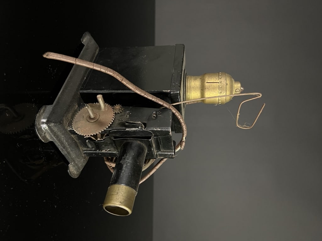 Antique Electrified projector: Not working, cord is cut.