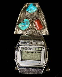 Coral Sterling Navajo Watch Band Nelsonic Watch: Coral and Sterling Watch Band with 1980's untested Nelsonic Watch. 1" Wide Sterling Side Pieces with Stretch Band.
