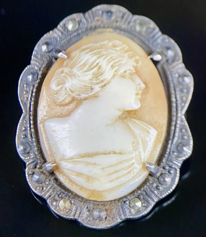 Sterling marcasite Cameo Brooch: Marked " Sterling" Measures: 1"