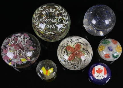 Magnum Frit & Art Glass Paperweights: Canada paperweight is resin and not glass Significant scratching and surface cracking present on small floral paperweight noted in photos