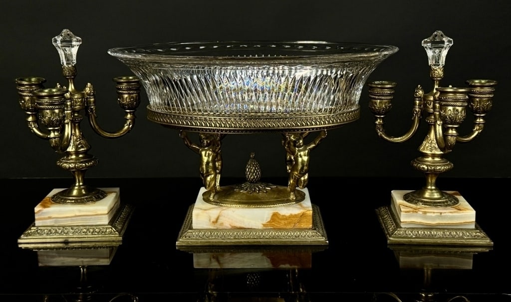 Pairpoint GIlt Bronze Cherub & Marble Center Piece: Phenomenal Set with seldom seen matching candlesticks. Overall excellent condition with only flaw being a small flea bite (Photographed) to the outter rim. Center Bowl Measures: 13" Long x 9" High.