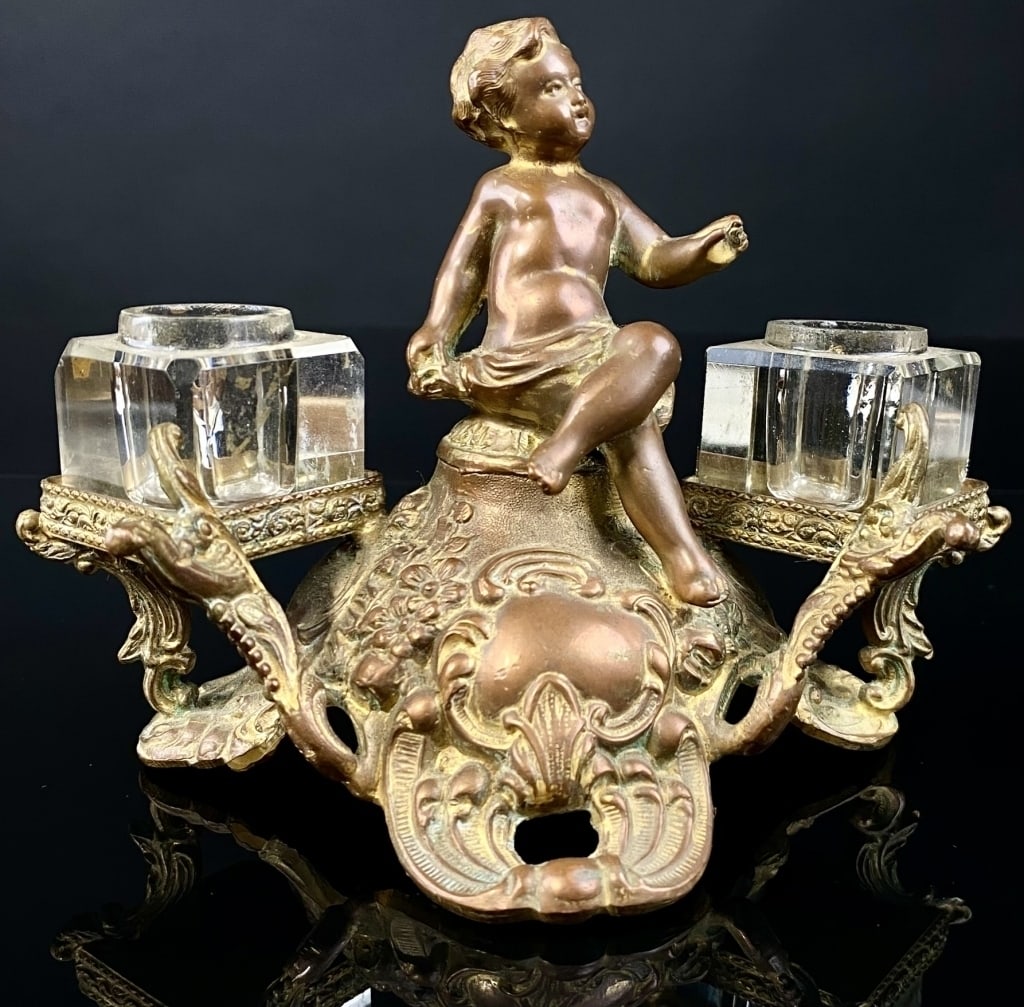 Antique Cherub Ink Well: Measures: 7" x 5" . chip on lower corner of one glass well shown in photo. inkwells are slightly different cuts of Glass